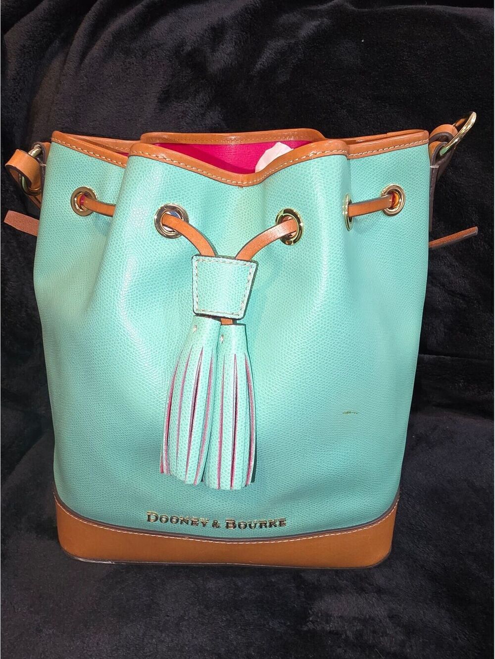 130. Dooney and Bourke Leather bucket bag turquoise